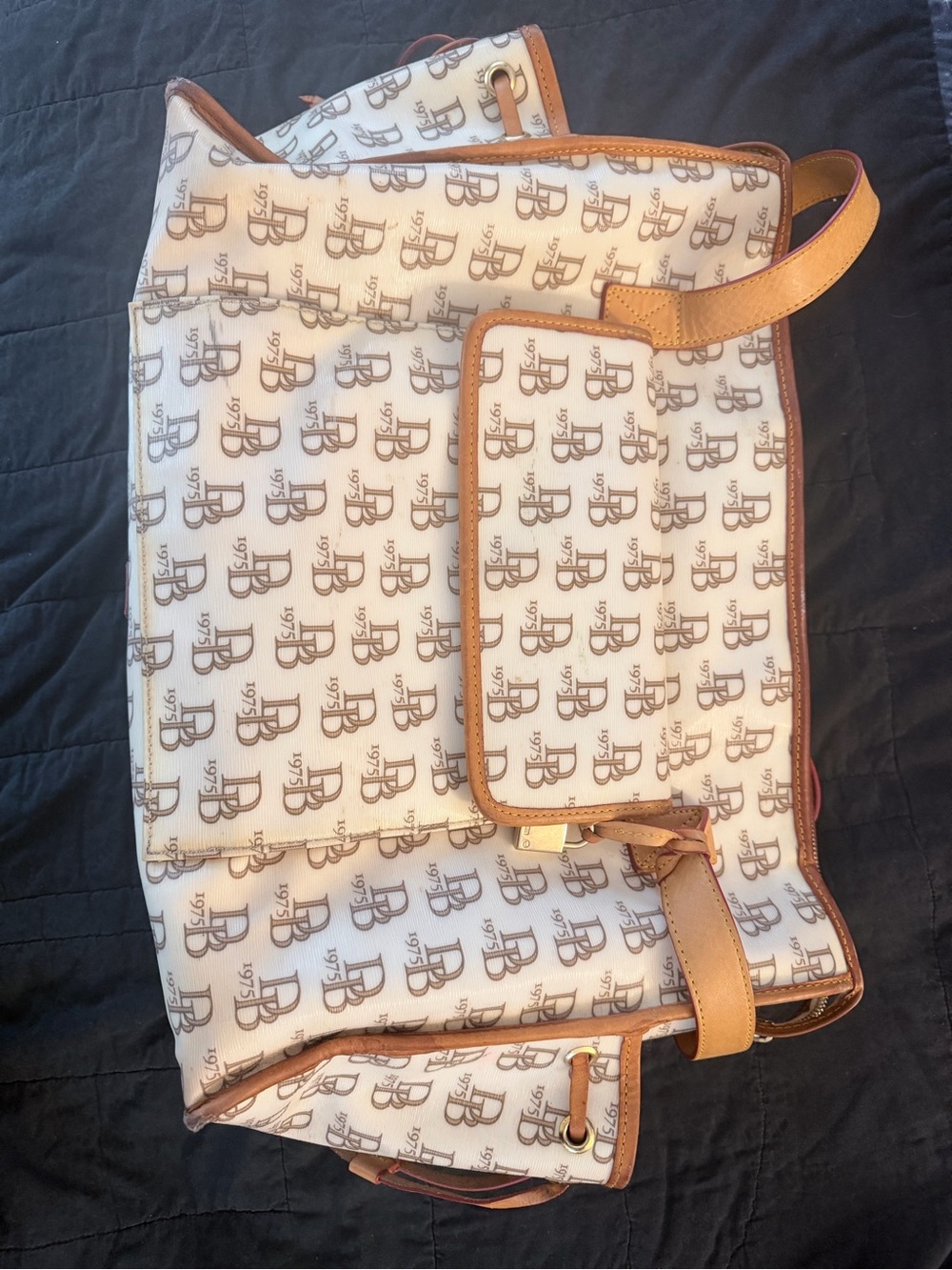 Dooney & Burke Monogram Leather Baby Bag in Cream and Tan